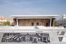 building with mural in front